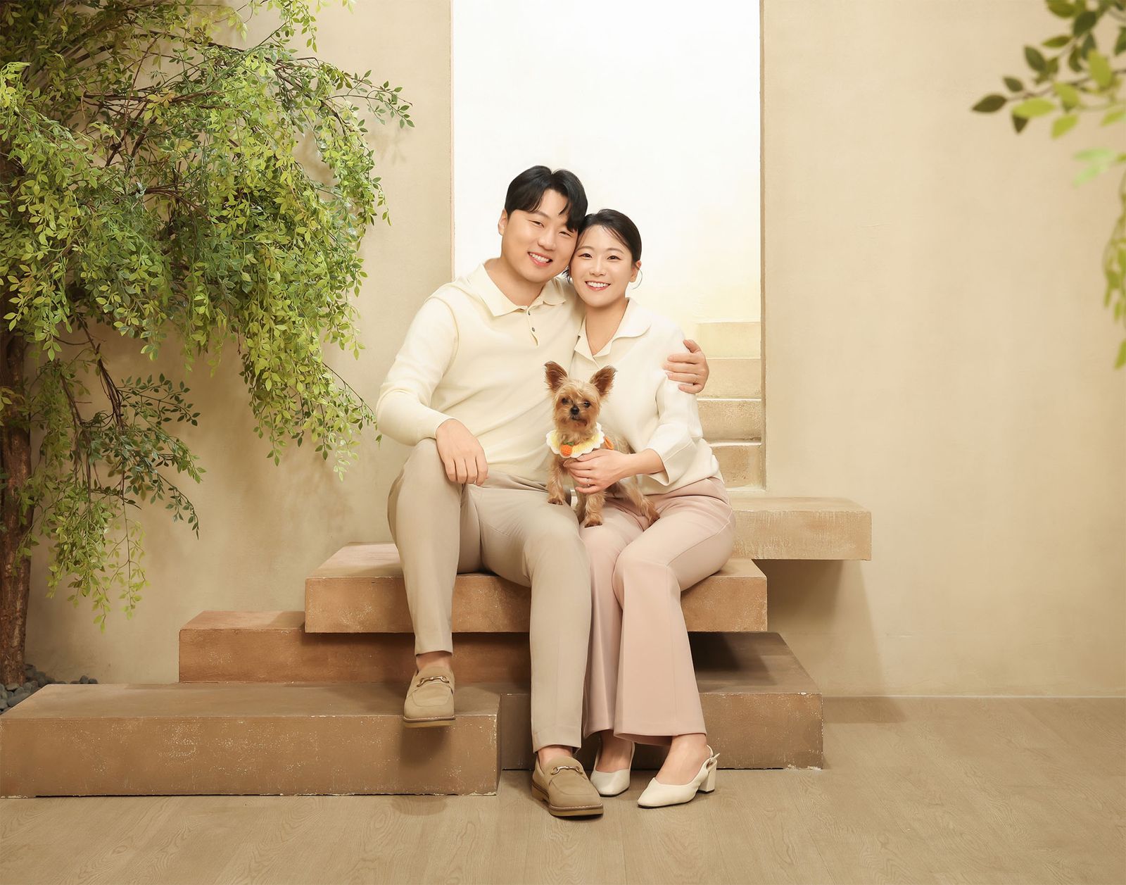 Hyun G Kwon's family with their dog Pori